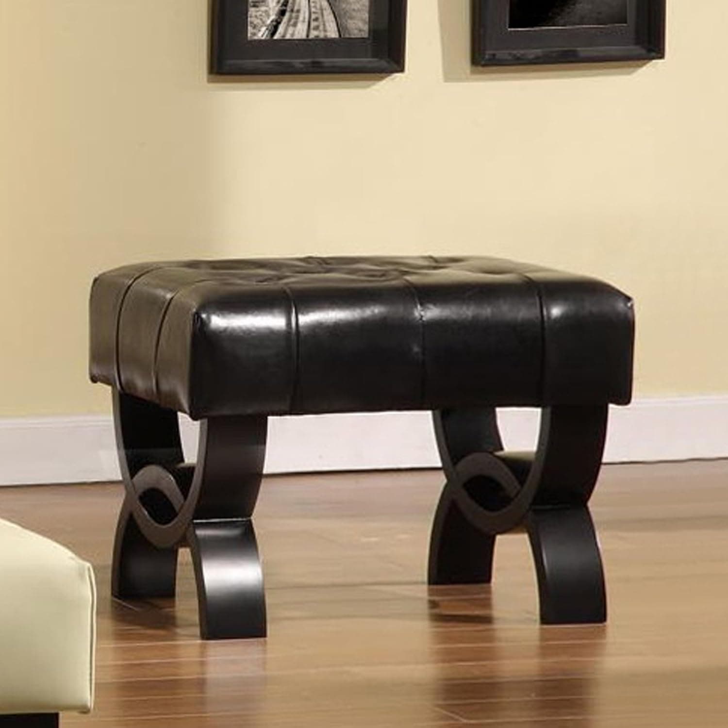 Armen Living Central Ottoman in Black Bonded Leather and Black Wood Finish