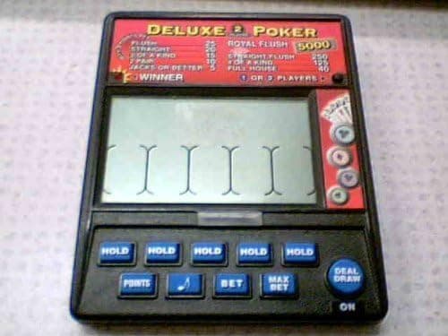 Tandy Corporation Tandy Radio Shack DELUXE 2 PLAYER POKER LCD Handheld Cat. No. 60-2656 (Buttons are HOLD, HOLD, HOLD, HOLD, HOLD, POINTS, SOUND SYMBOL, BET, MAX BET & DEAL DRAW/ON)