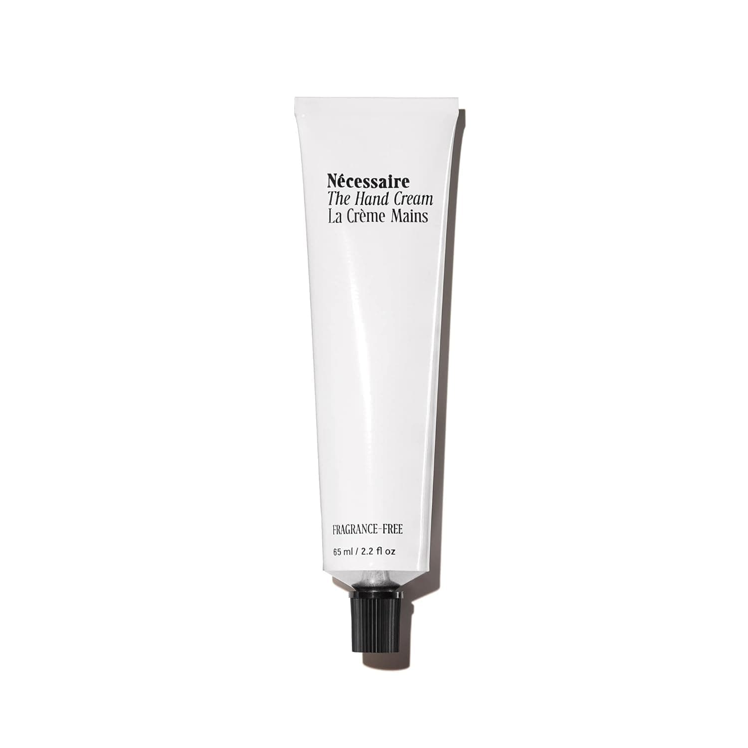 Nécessaire The Hand Cream. Fragrance-Free. Replenishing Treatment. Peptide, Niacinamide + Vitamin-Rich Marula Oil. Hypoallergenic. Dermatologist-Tested. Approved By National Eczema Association. 65 ml / 2.2 fl oz