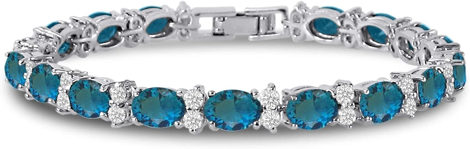 KEZEF CZ Tennis Bracelet - Oval 7x5 CZ & Round 2.50mm White CZ - Silver over Brass - 7 Inch