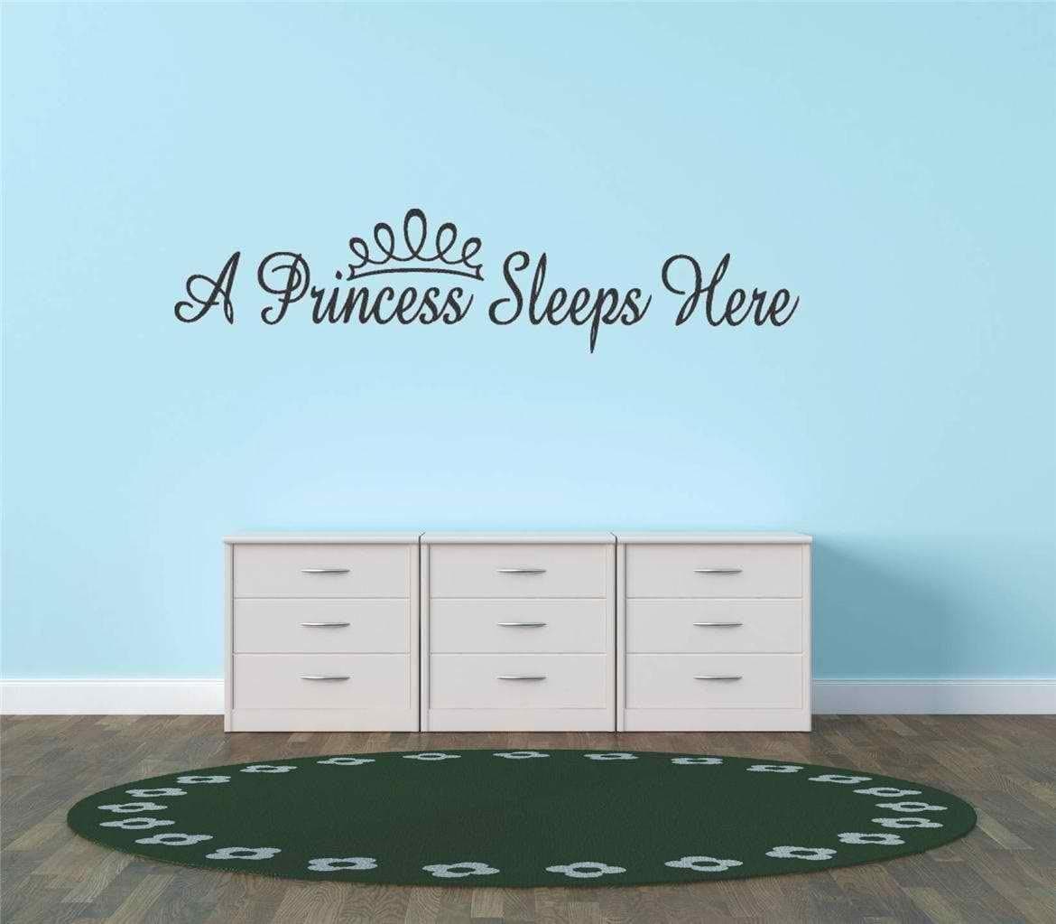 Decal – Vinyl Wall Sticker : A Princess Sleeps Here Teen Girl Baby Inspirational Quote Sign Banner Bumper Sticker Living Room Bedroom Kitchen Home Decor Picture Art Image Peel & Stick Graphic Mural Design Decoration - Discounted Sale Item – Size : 10 Inches X 20 Inches - 22 Colors Available