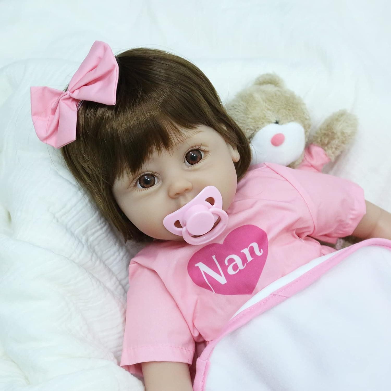 CARANOVO Reborn Toddler Girl Dolls - 22 inch Lifelike Reborn Baby Dolls, Realistic Newborn Girl Doll, Brown Eyes Weighted Soft Body Real Baby, Gift Box for 3 + Year Old Kids