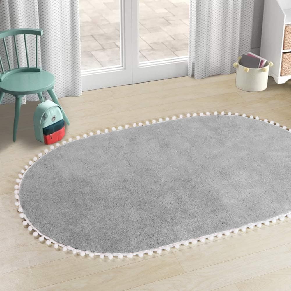LEEVAN Faux Wool Area Rug Cute Pom Pom Fringe Nursery Rug Baby Crawling Mat Kids Play Non-Slip Floor Carpet for Living Room Bedroom Sofa Oval Round Rugs, 3 x 5 ft-Light Grey