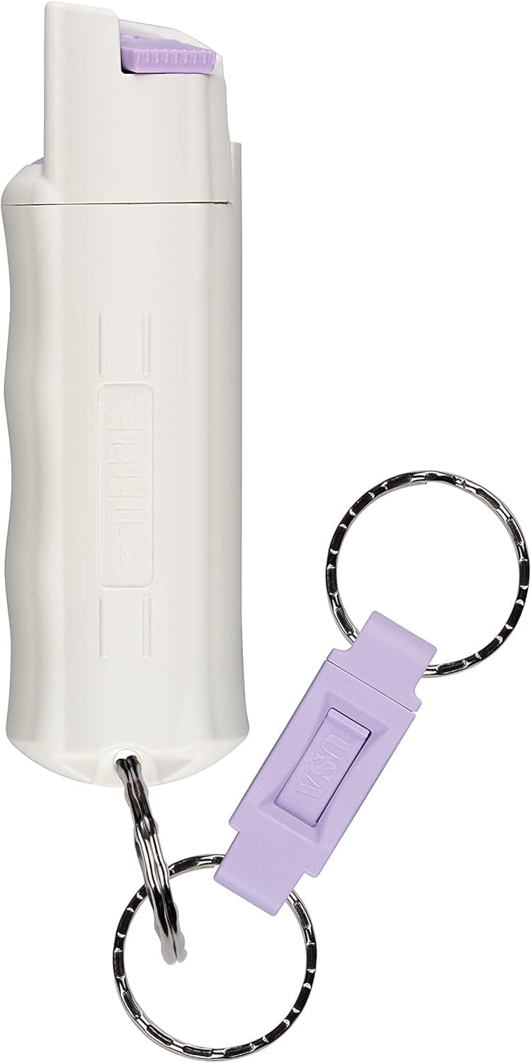SABRE Pepper Spray with Glow in the Dark Case, Visible at Night, 25 Bursts of Maximum Police Strength OC Spray, Quick Release Key Ring For Easy Access, Finger Grip for Accurate Aim, Twist Lock Safety