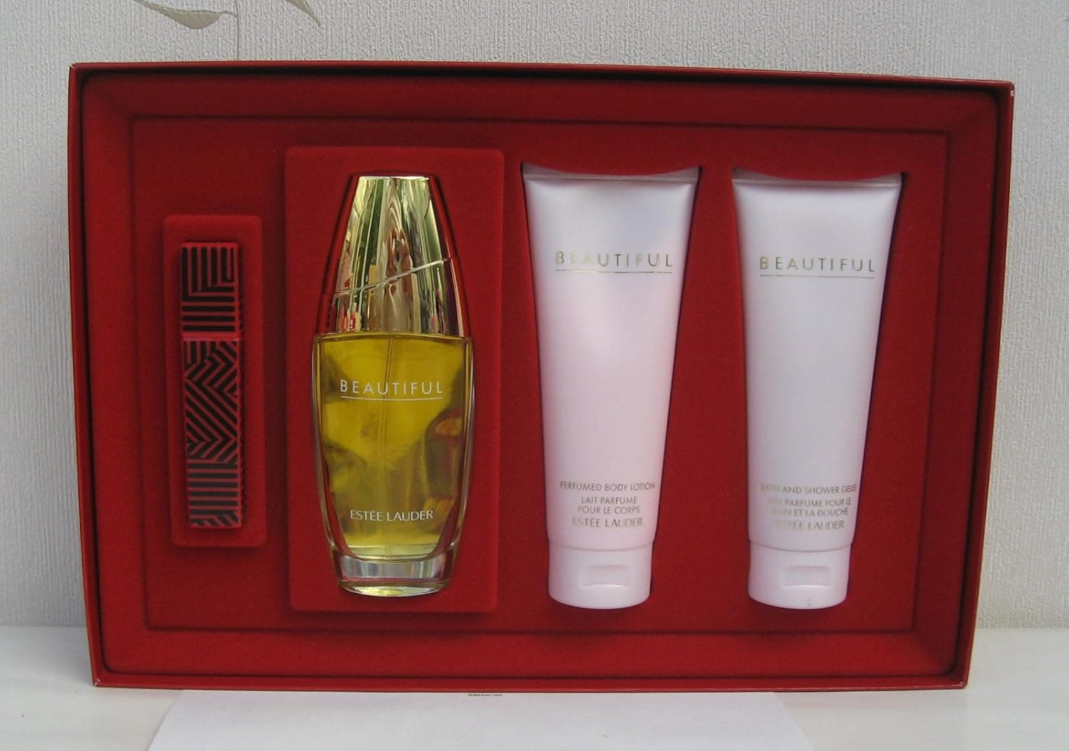 Estée Lauder 'Beautiful Romantic Destinations' Set (Limited Edition) = Eau de parfum spray (2.5 oz.) = Eau de parfum rollerball pen (0.2 oz.)=Perfumed body lotion (3.4 oz.)=Bath and shower gelée (3.4 oz.)