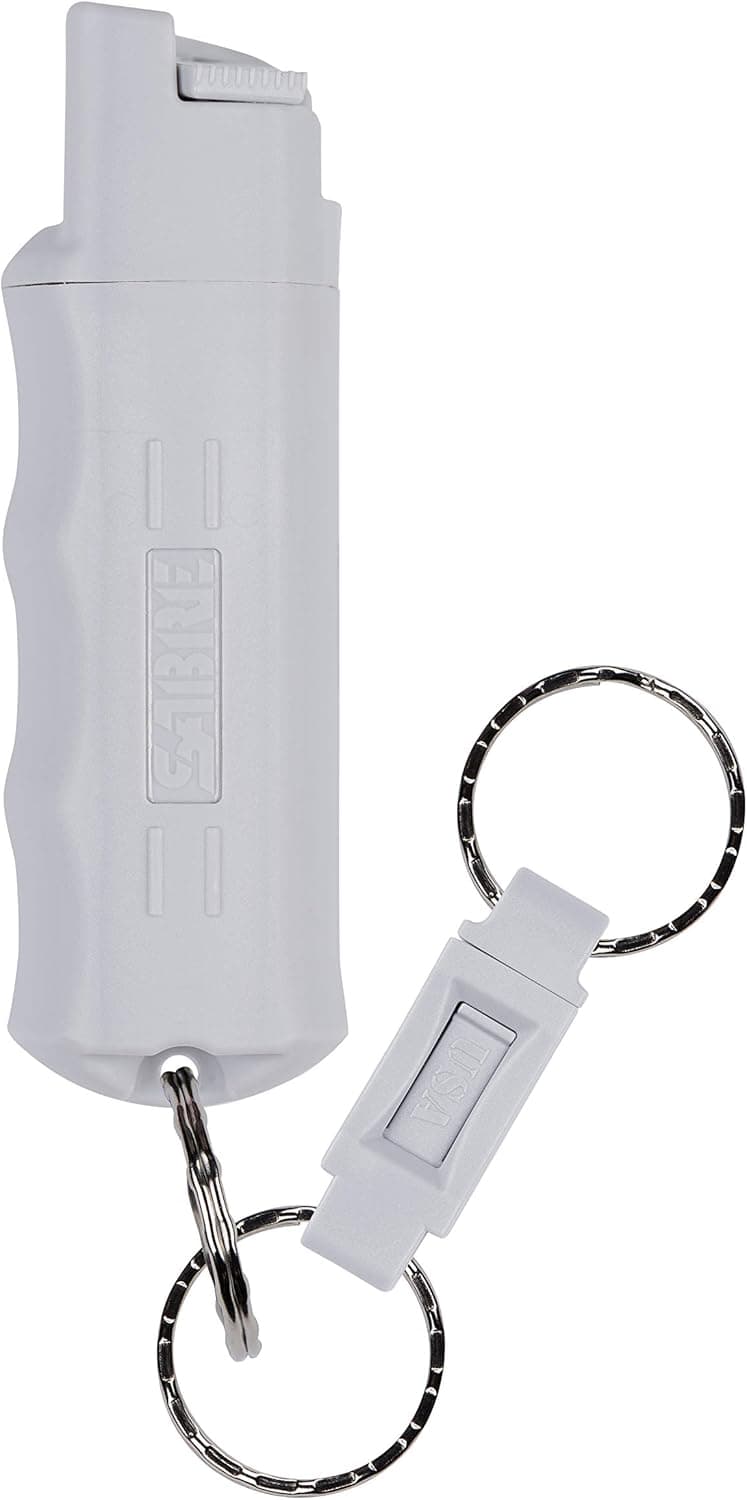 SABRE Pepper Spray, Quick Release Keychain for Easy Carry and Fast Access, Finger Grip for More Accurate and Faster Aim, Maximum Police Strength OC Spray, 25 Bursts, Secure and Easy to Use Safety