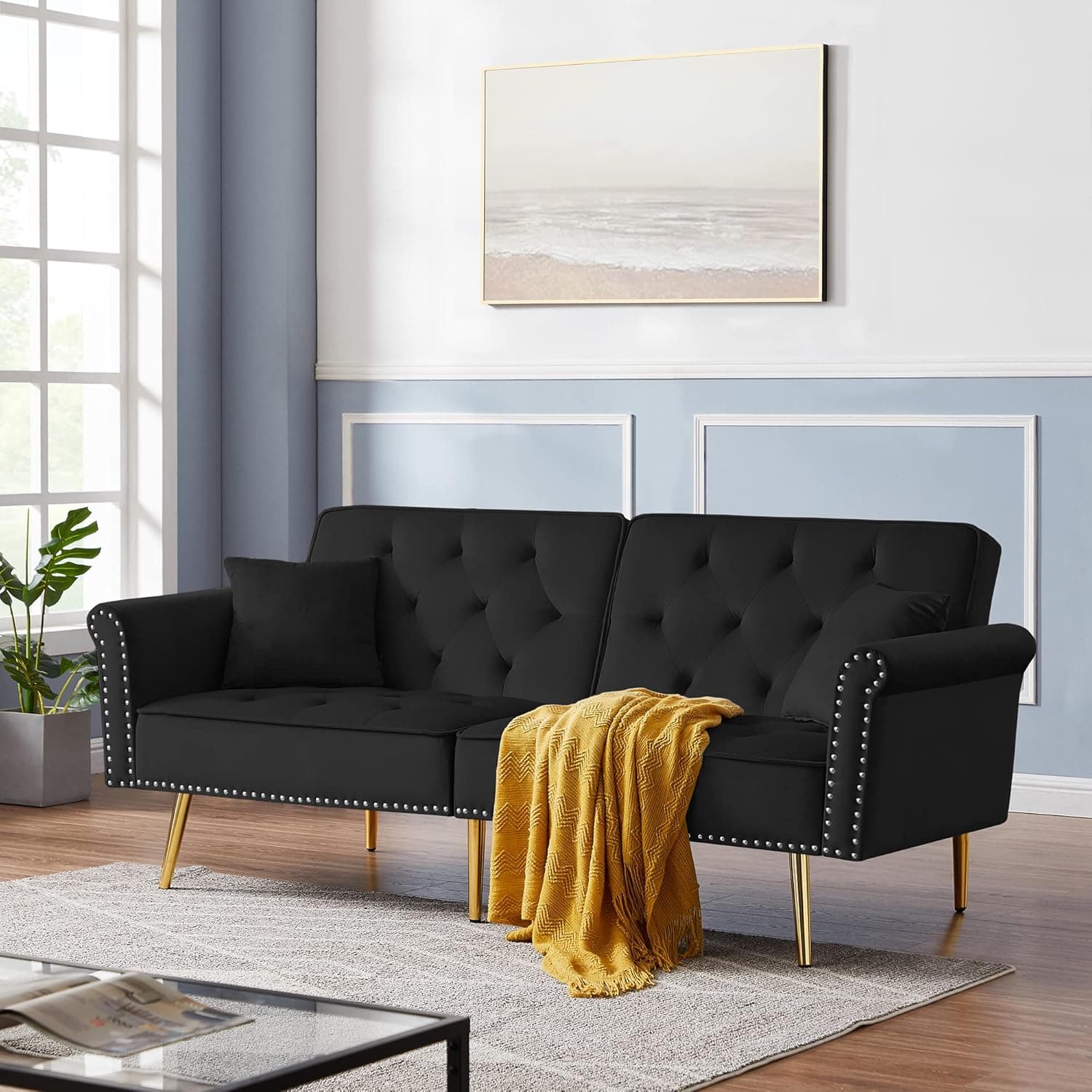 Zushule Futon Sofa Bed -Velvet Tufted Convertible Couch with 2 Pillows, Nailhead Trim, and Metal Legs- - Small Sofabed for Bedroom, Living Room, Apartment - Black with Gold Detail