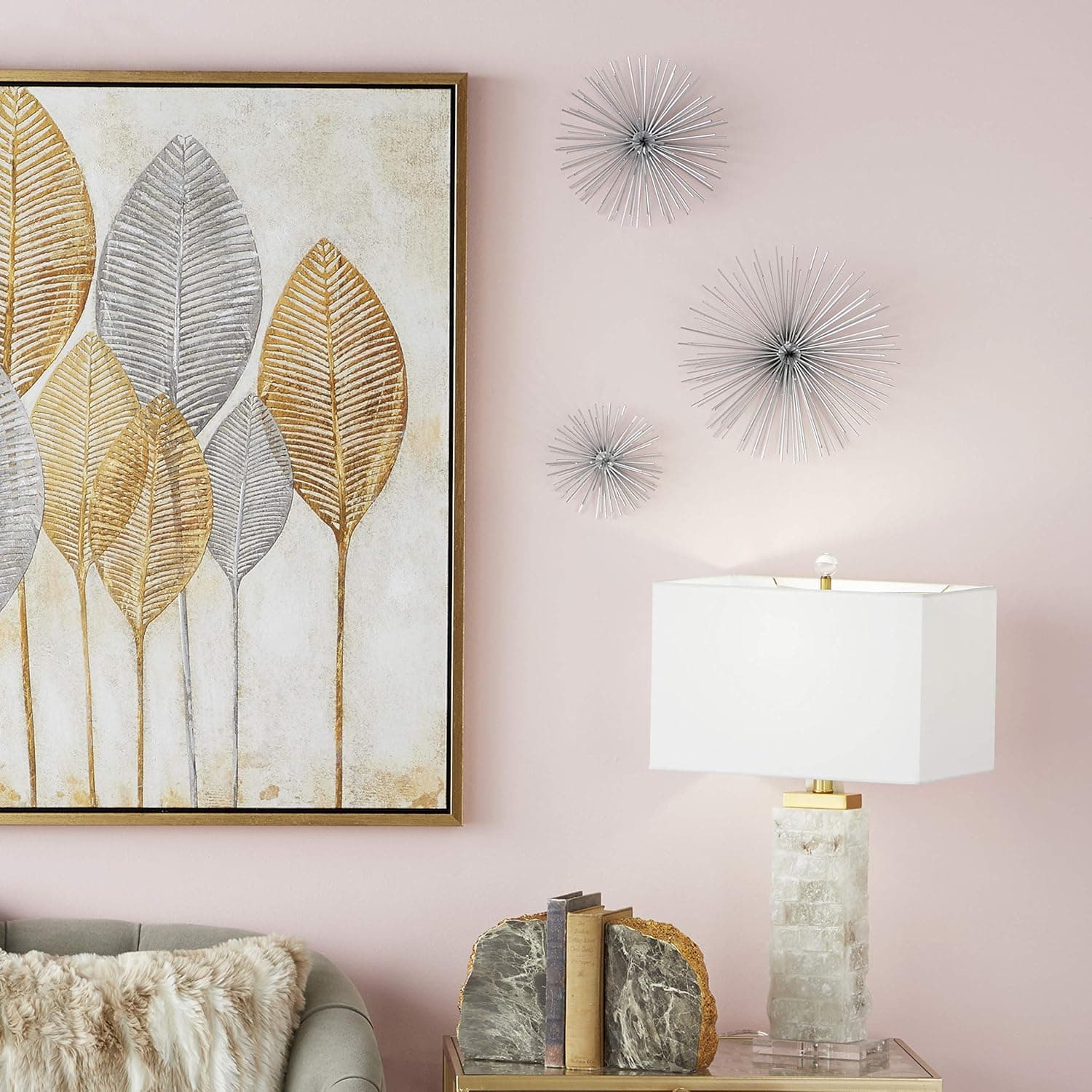 CosmoLiving by Cosmopolitan Metal Starburst 3D Wall Decor, Set of 3 6", 9", 12"W, Silver