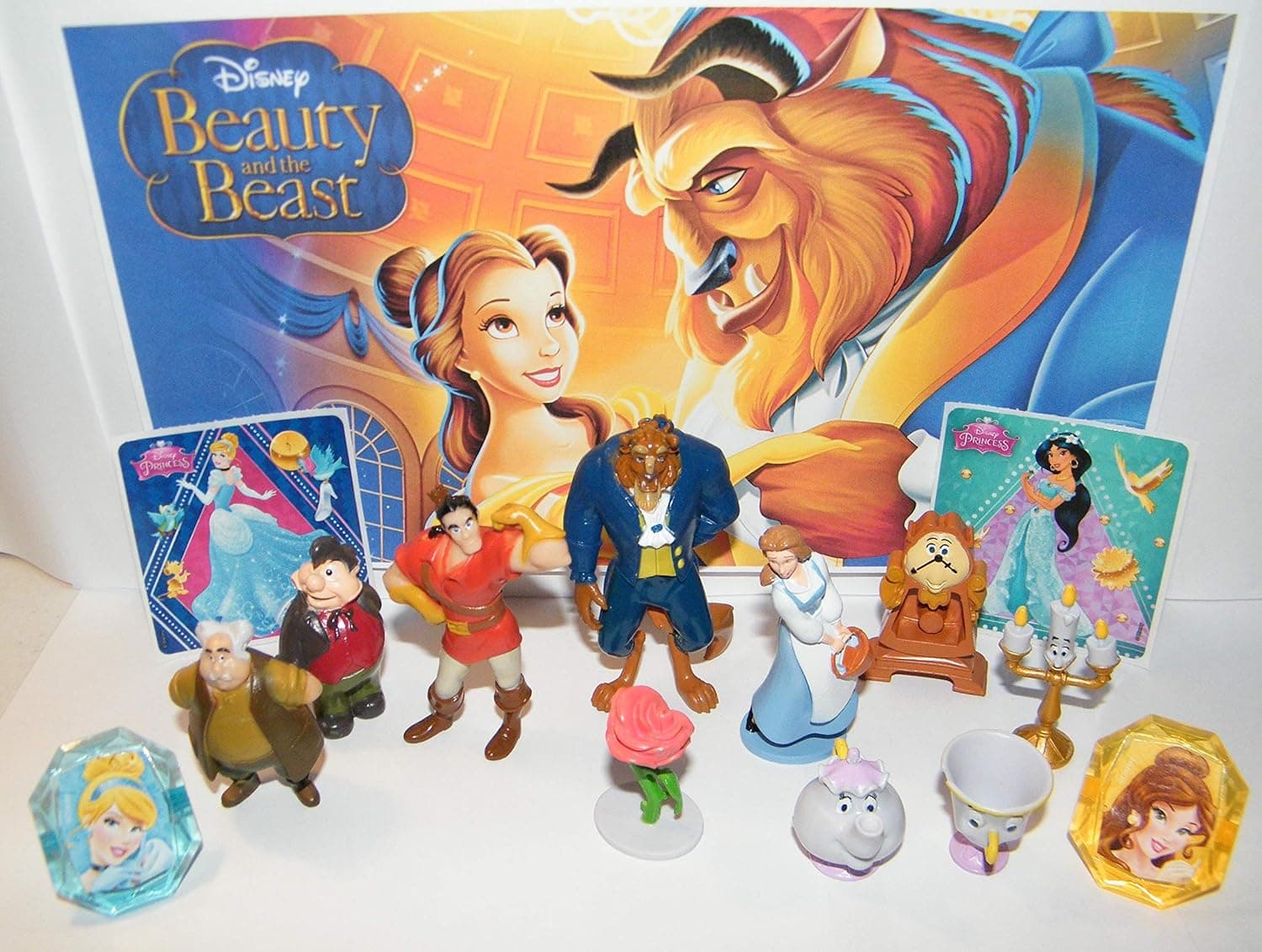 HappiToys Beauty and The Beast Movie Deluxe Figure Toy Set with 2 ToyRings, 2 Stickers and 10 Fun Figures Including Belle, The Beast Prince and All The Popular Characters!