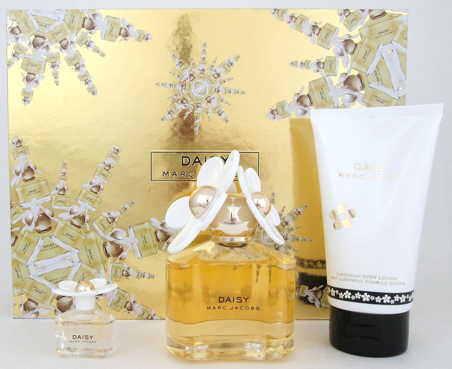 Marc Jacobs Gift Set:(Eau De Toilette Spray 3.4 oz + Luminous Body Lotion 5.1 oz + Eau De Toilette Mini 4 ml)