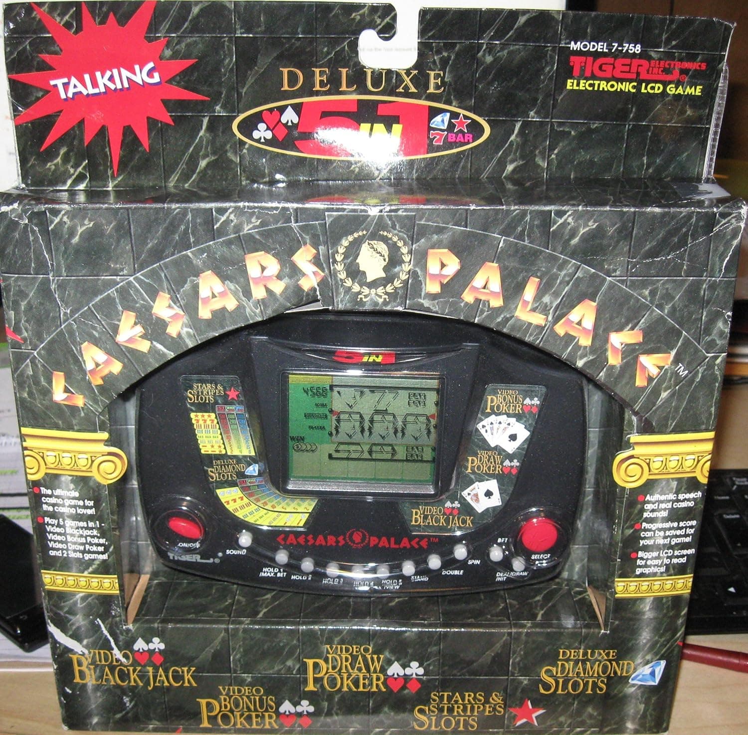 Tiger Electronics Caesars Palace 5 in 1 Handheld Game (MADE BY TIGER ELECTRONICS, 1995 VERSION). Games on the Handheld are Stars & Stripes Slots, Deluxe Diamond Slots, Video Bonus Poker, Video Draw Poker, & Video Blackjack