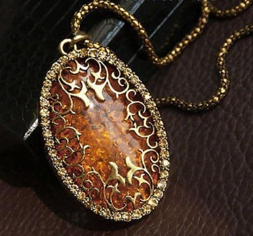 Phonphisai shop hot Womens Jewelry Oval Amber Hollow Rhinestone Long Chain Pendant Necklace