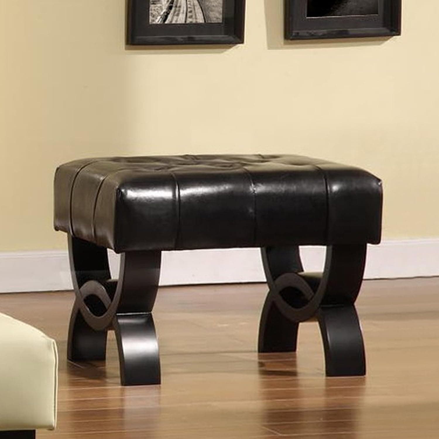 Armen Living Central Ottoman in Black Bonded Leather and Black Wood Finish