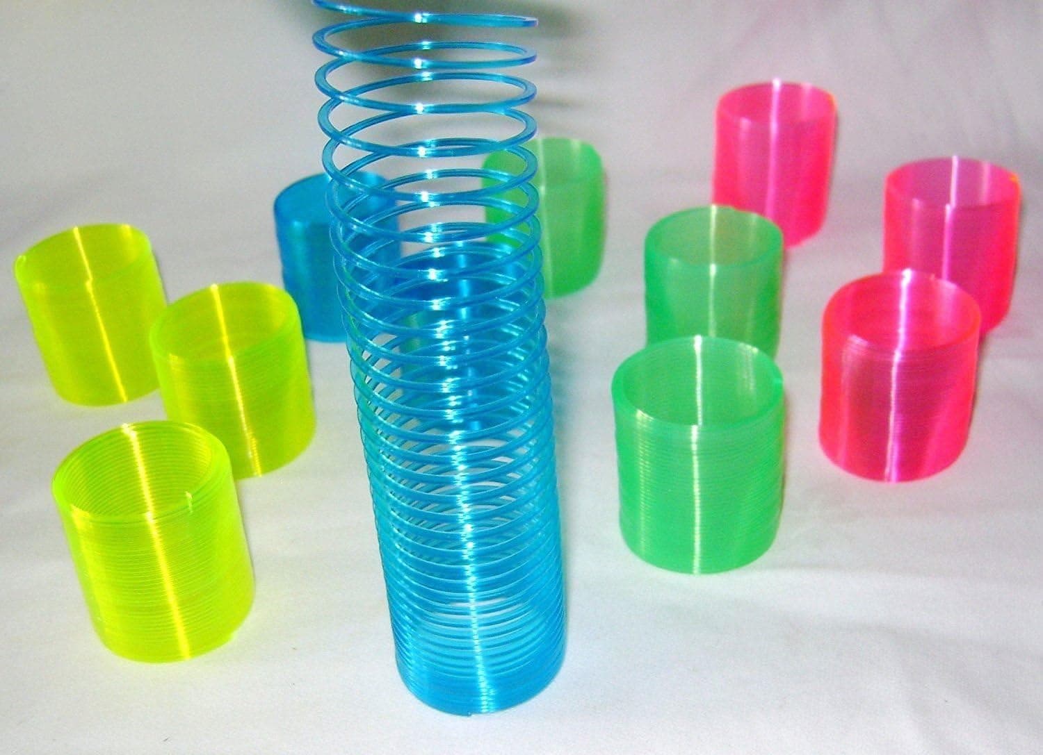 12 Mini magic slinky springs.party bag toy fillers.